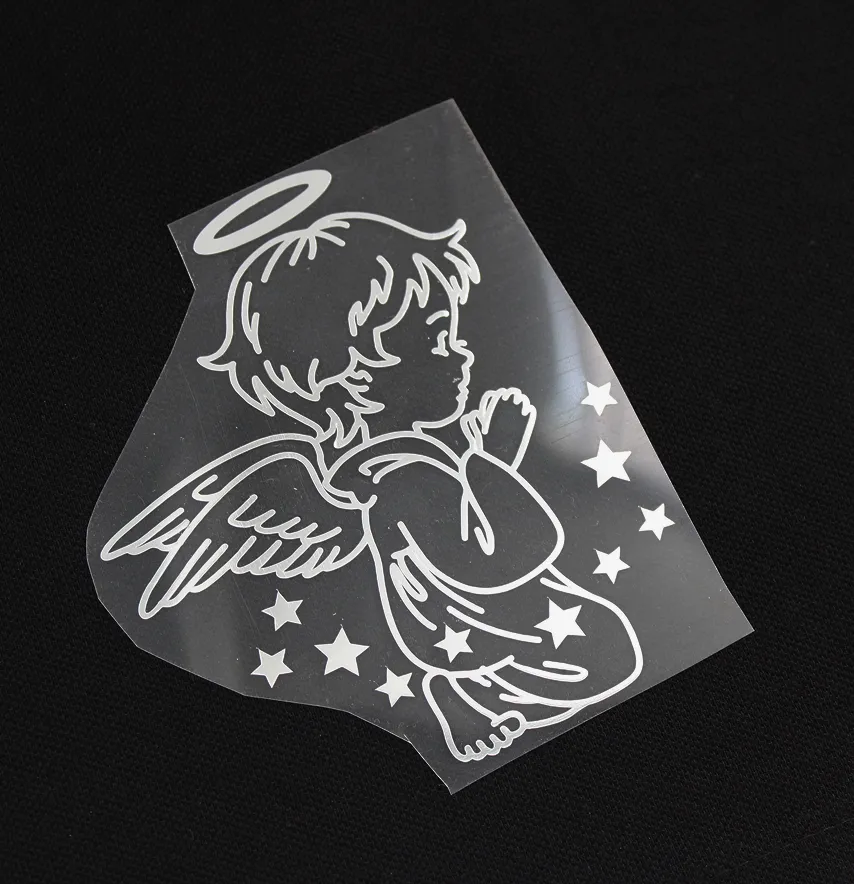 Термоаппликация из пленки "Ангел со звездочками" 86*100 мм серебряного цвета-3