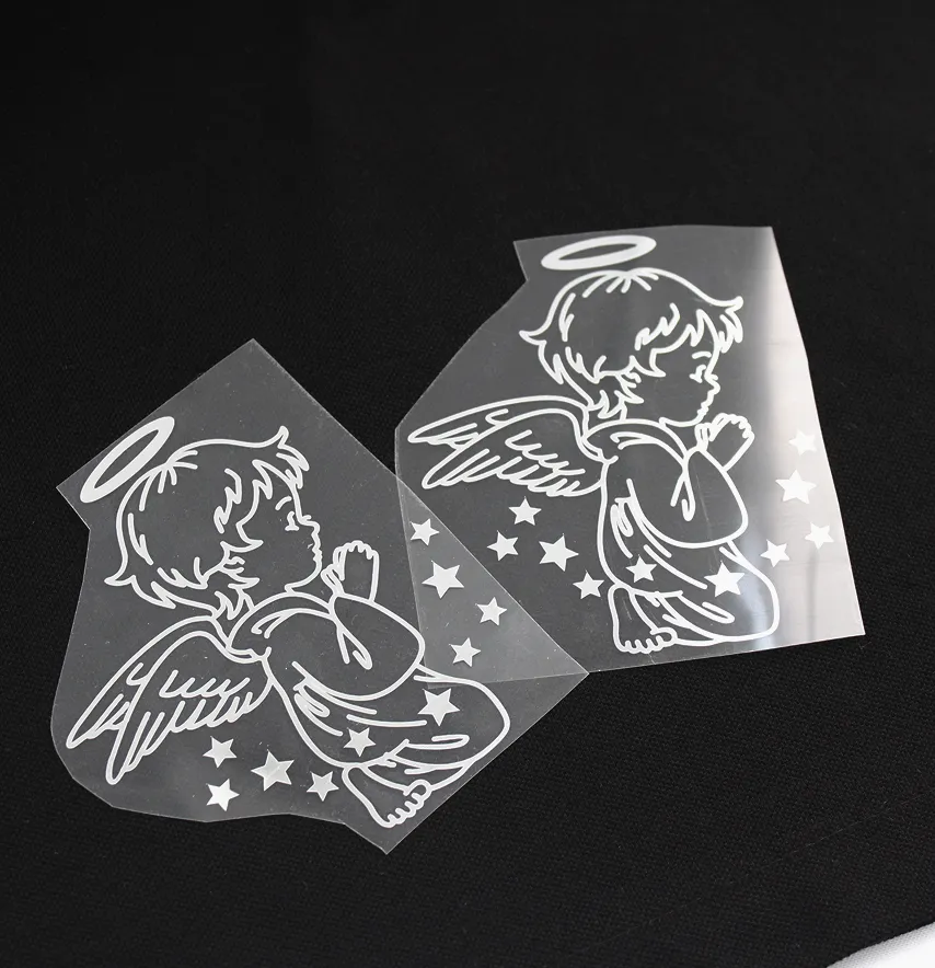 Термоаппликация из пленки "Ангел со звездочками" 86*100 мм серебряного цвета-4