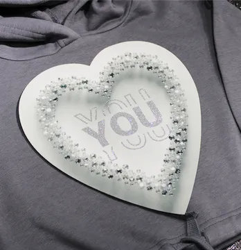 Нашивка тканева з декором "You" срібне серце з глітером 21,5*24 см