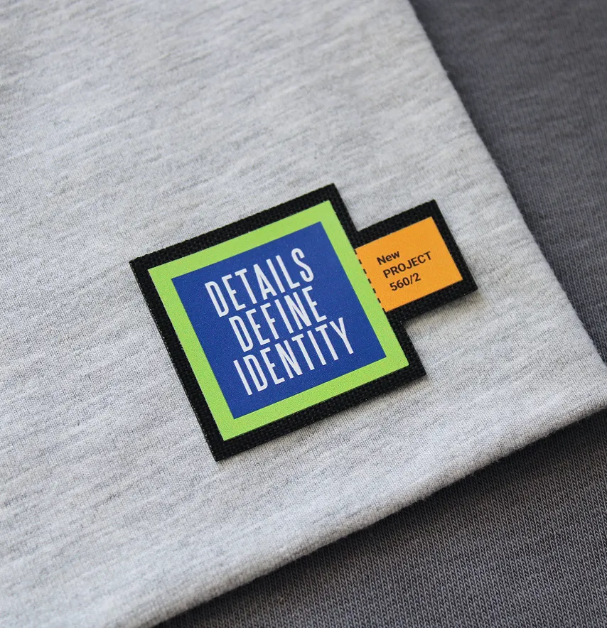 Нашивка "Details Define Identity" 55*40 мм кольорова-0