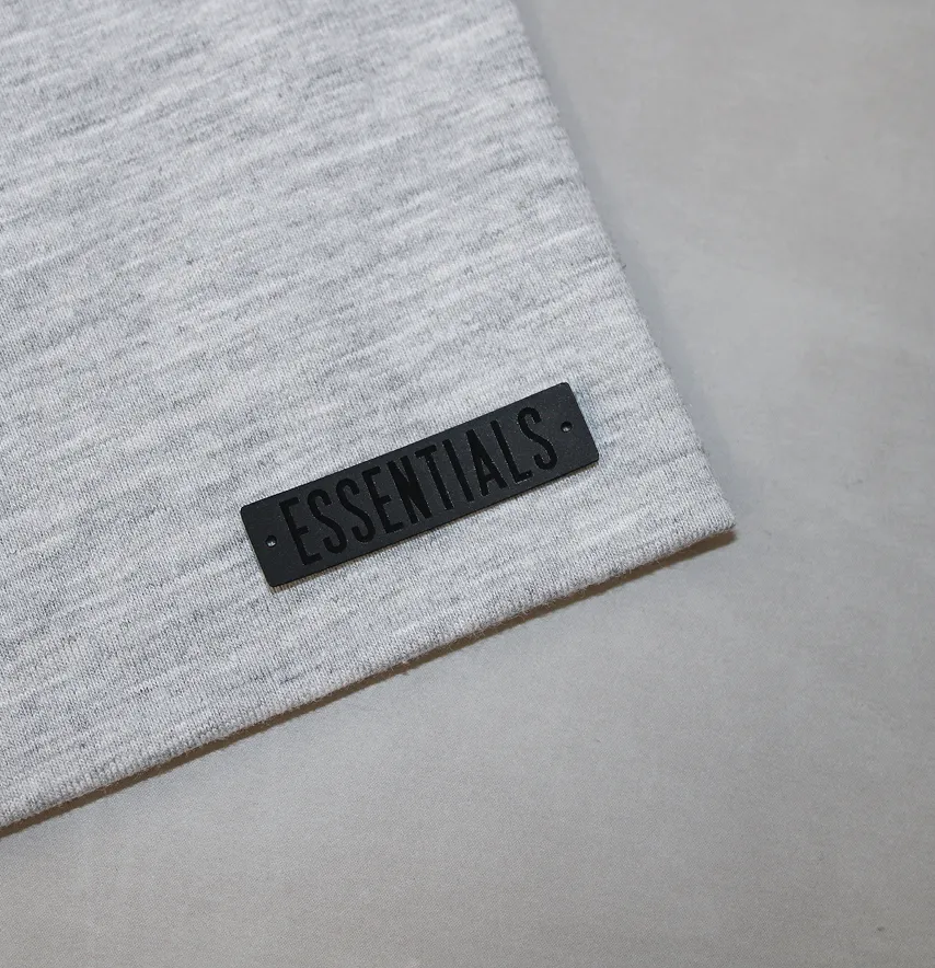 Нашивка "Essentials" 40*10 мм чорного кольору-1