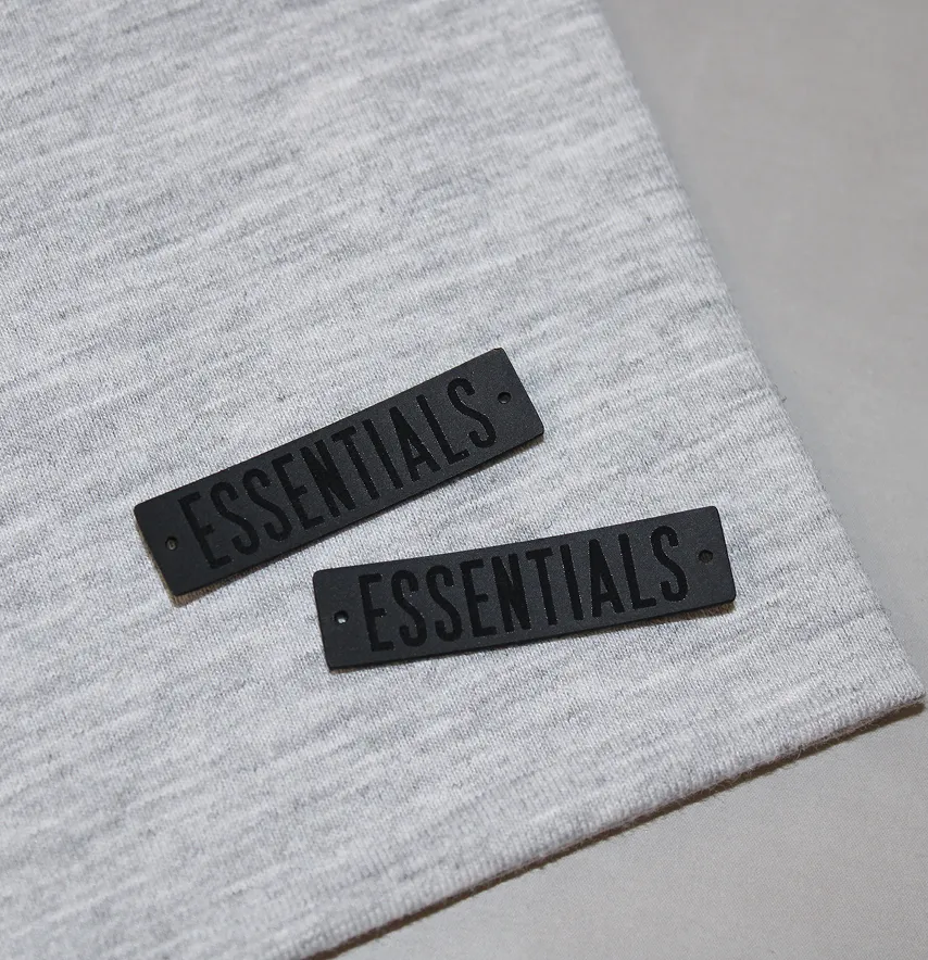 Нашивка "Essentials" 40*10 мм чорного кольору-2