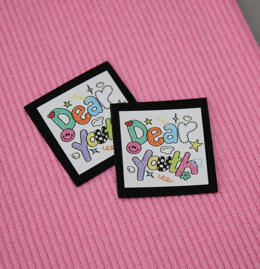 Нашивка "Dear youth" на білому 30*30 мм чорна основа-1