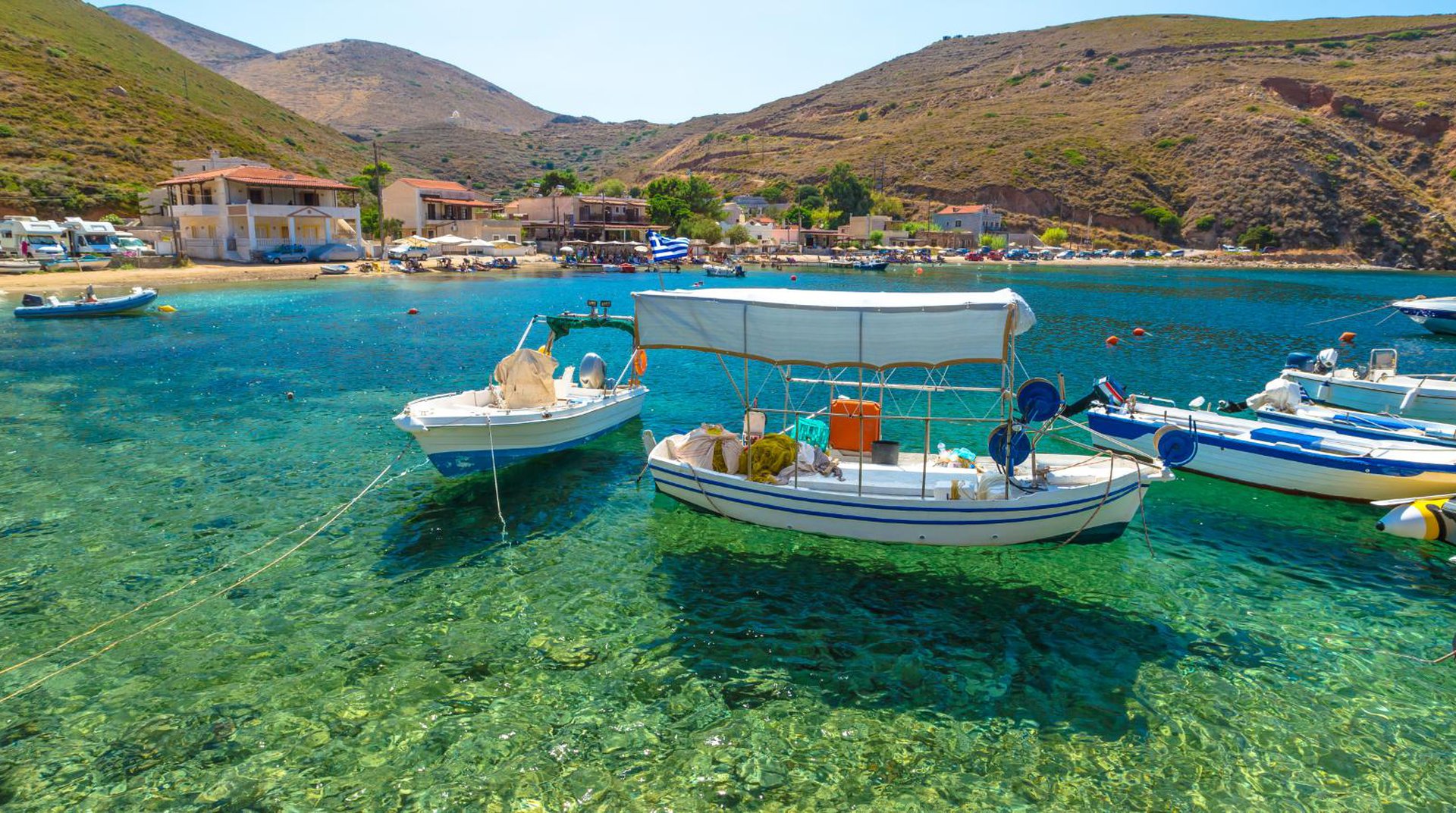 Boats Floating in Crystal Clear Waters