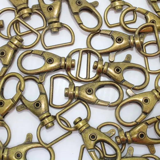 Fecho Mosquetao Base Reta 38Mm Em Zamak (100 Pc) 075 - Ouro Velho