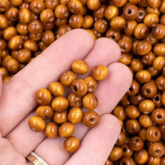Bola Passante 08Mm Em Madeira Com 500G