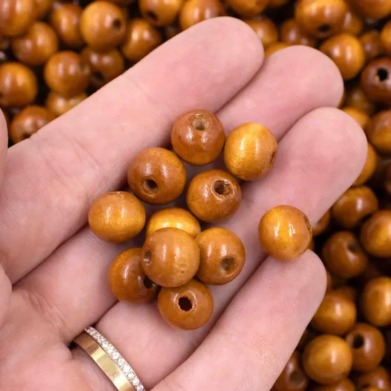 Bola Passante 10Mm Em Madeira Com 500G