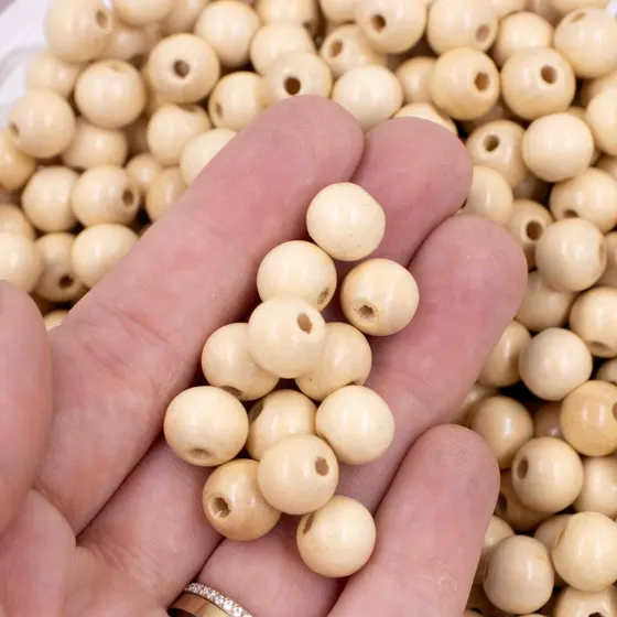 Bola Passante 10Mm Em Madeira Com 500G