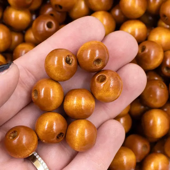 Bola Passante 14Mm Em Madeira Com 500G