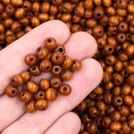 Bola Passante 06Mm De Madeira Com 500G