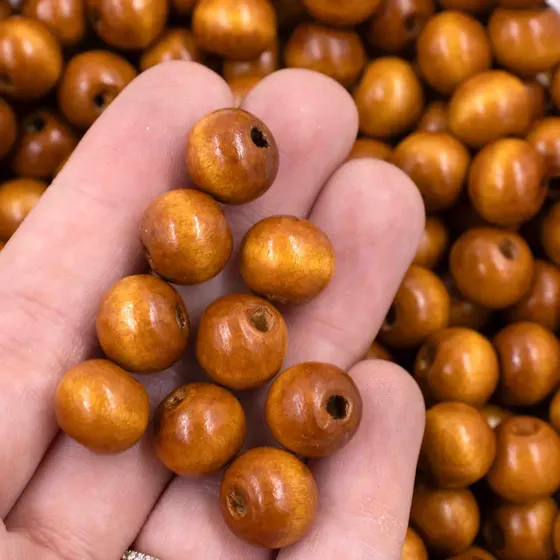 Bola Passante 12Mm Em Madeira Com 500G