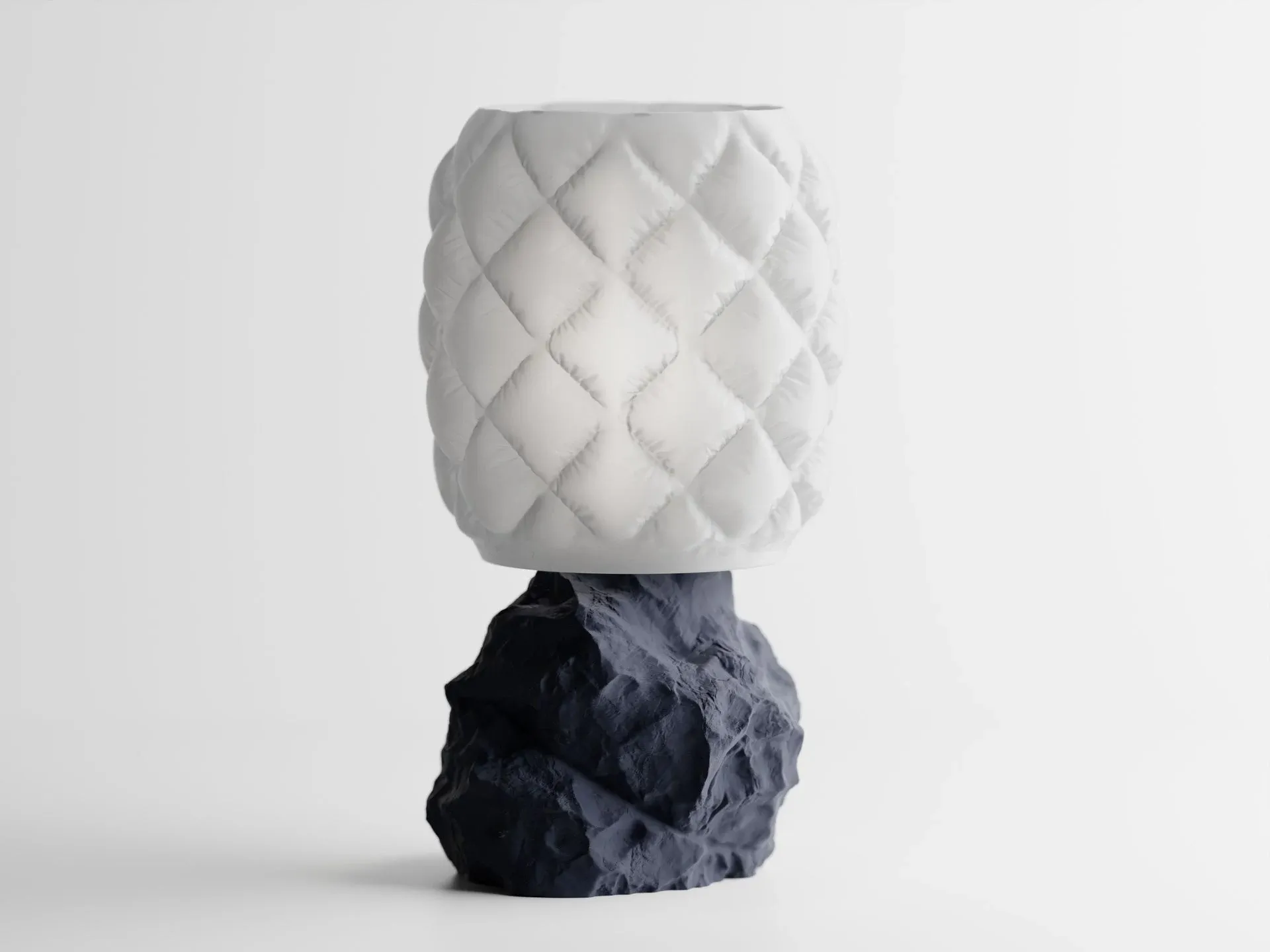 Boulderlit in Dark Blue - 3D printed table lamp with a stone-form base and quilted shade