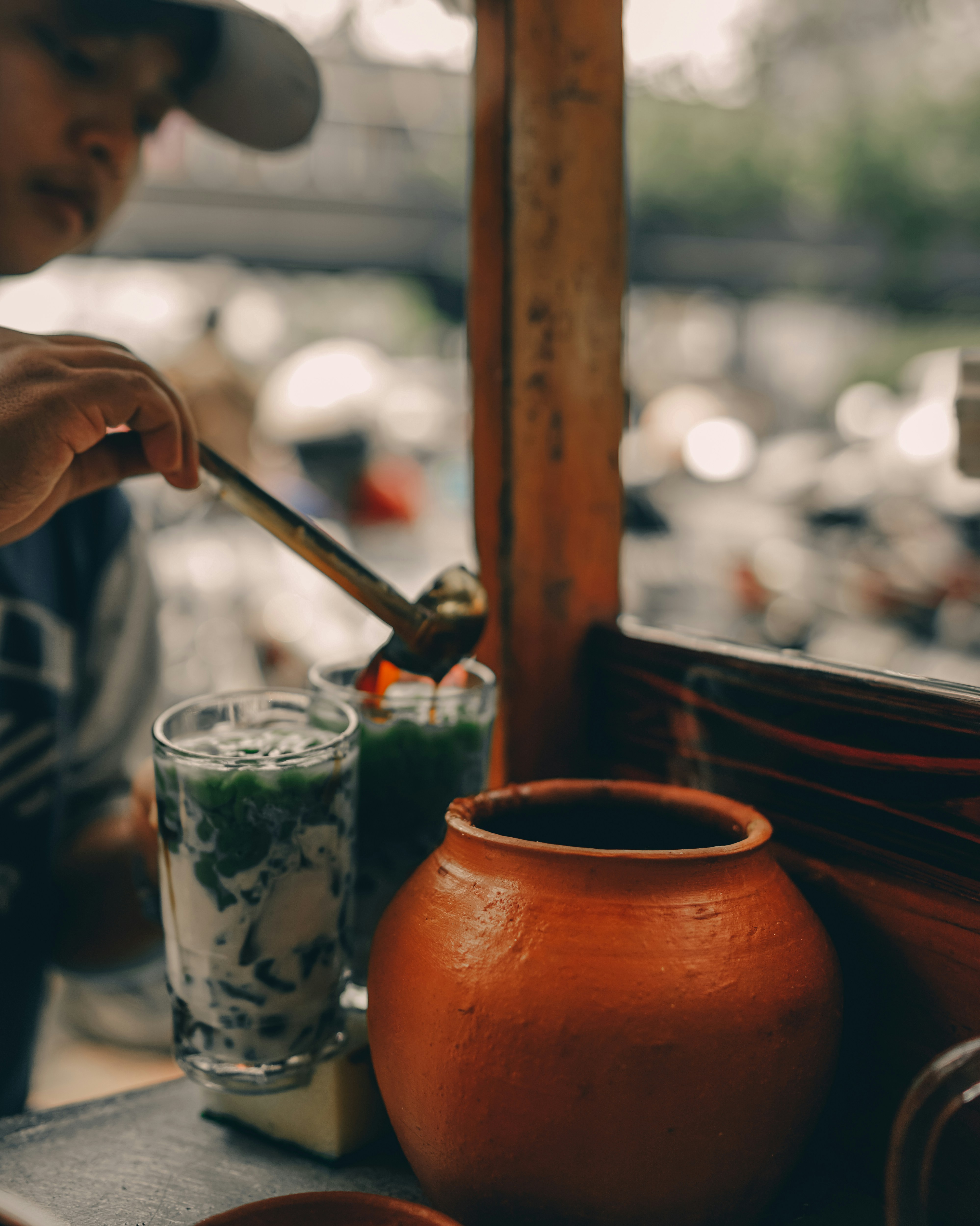 A man is making Cendol Dawet ice.