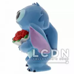 Disney Showcase Collection Lilo & Stitch Hugs Stitch Flowers Figurine résine 6cm