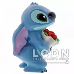 Disney Showcase Collection Lilo & Stitch Hugs Stitch Flowers Figurine résine 6cm