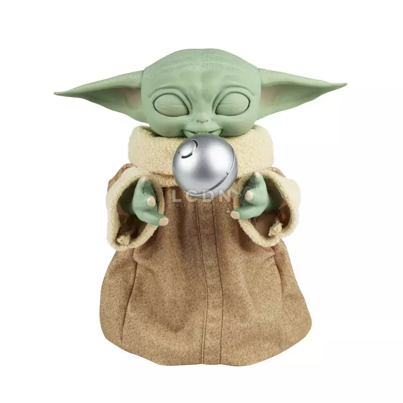 Figurine Grogu mangeant une grenouille THE MANDALORIAN Star Wars