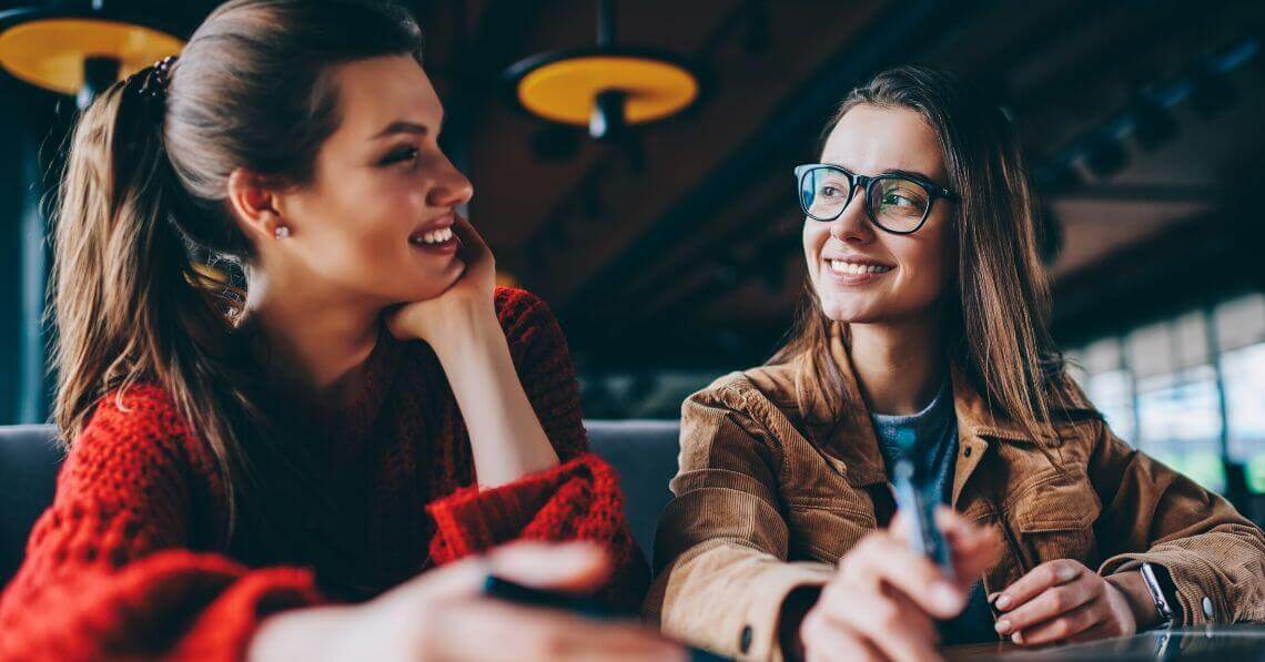 Two young women connecting