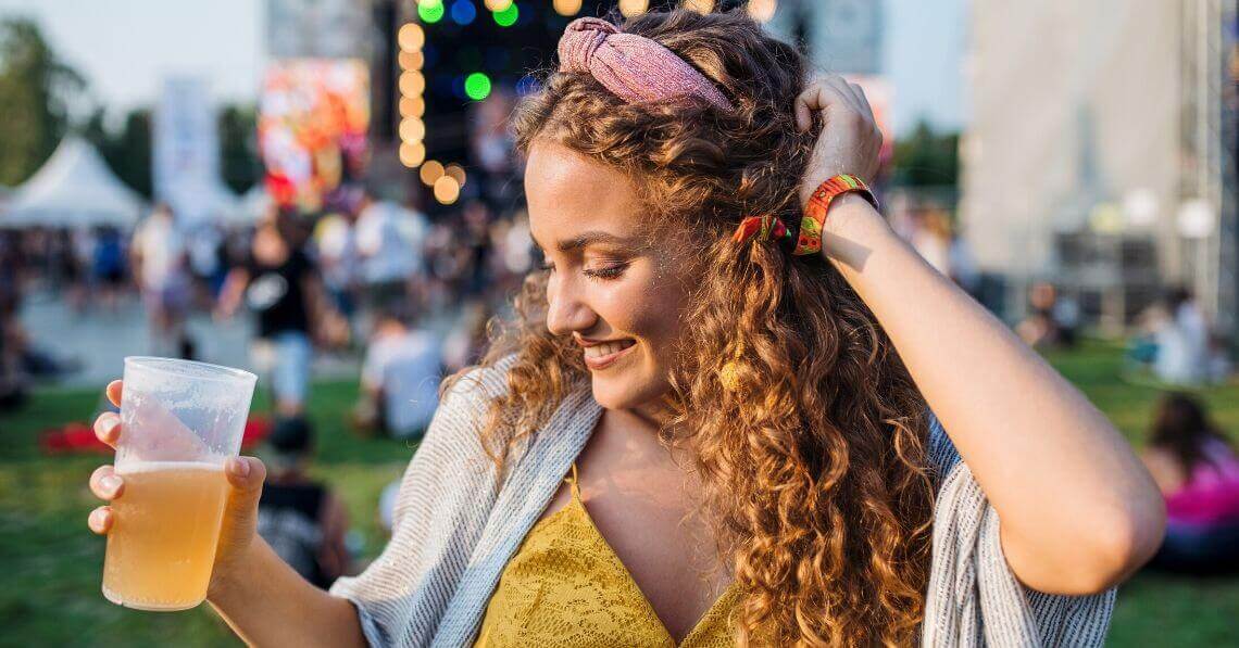 Young woman dancing at a music festival