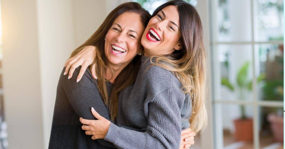 Mother and daughter embracing