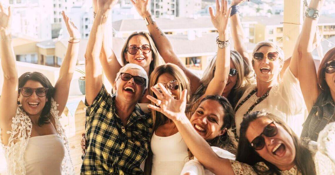 Happy women posing for a photograph