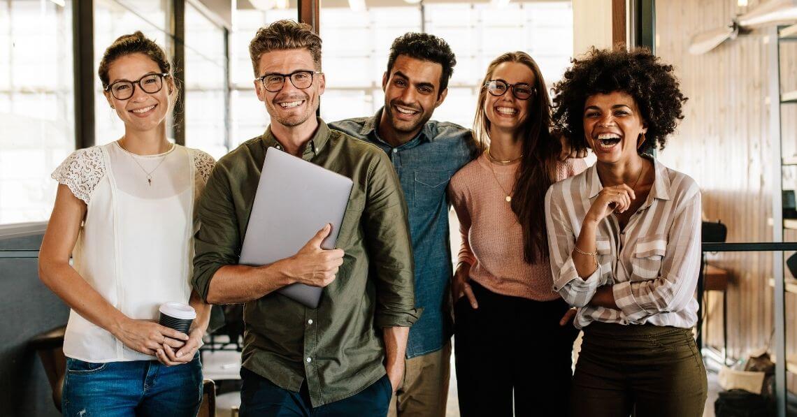 Colleagues laughing at the office