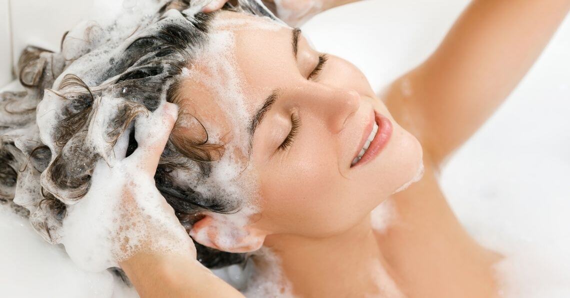 Woman washing her hair