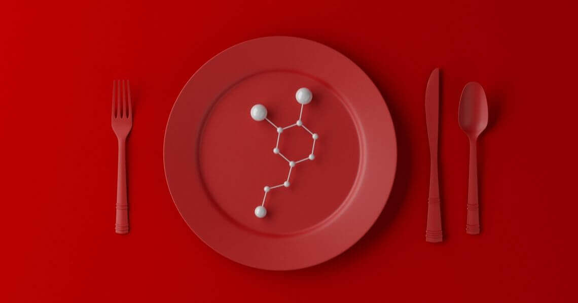 A red plate and red cutlery