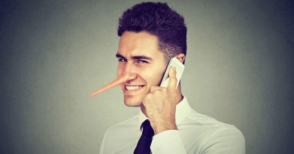 A liar with a long nose smiling on the phone