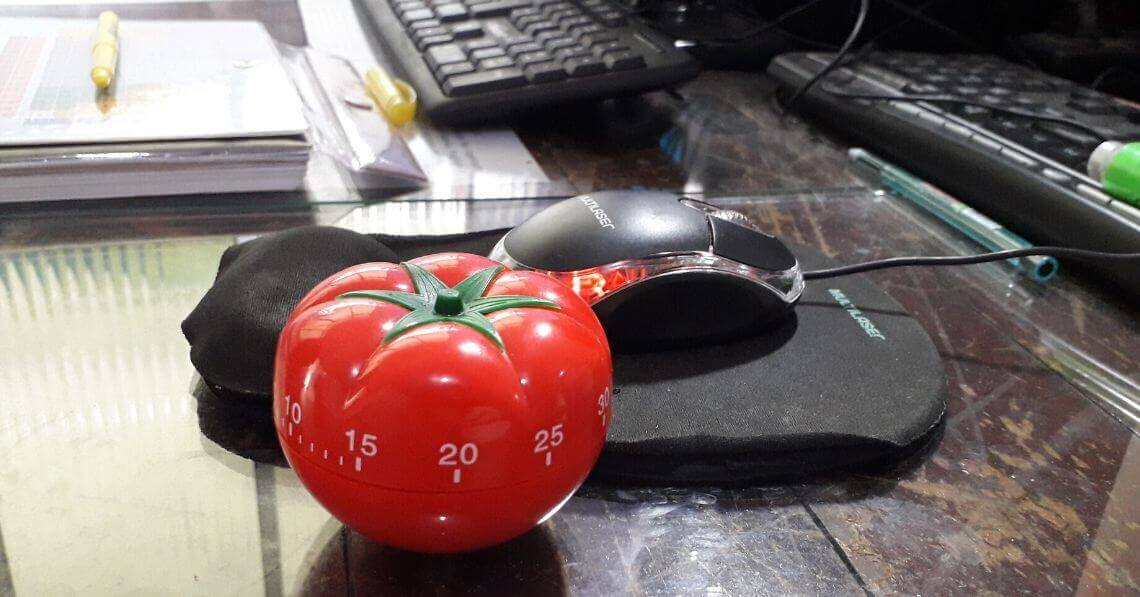 A timer next to the computer mouse