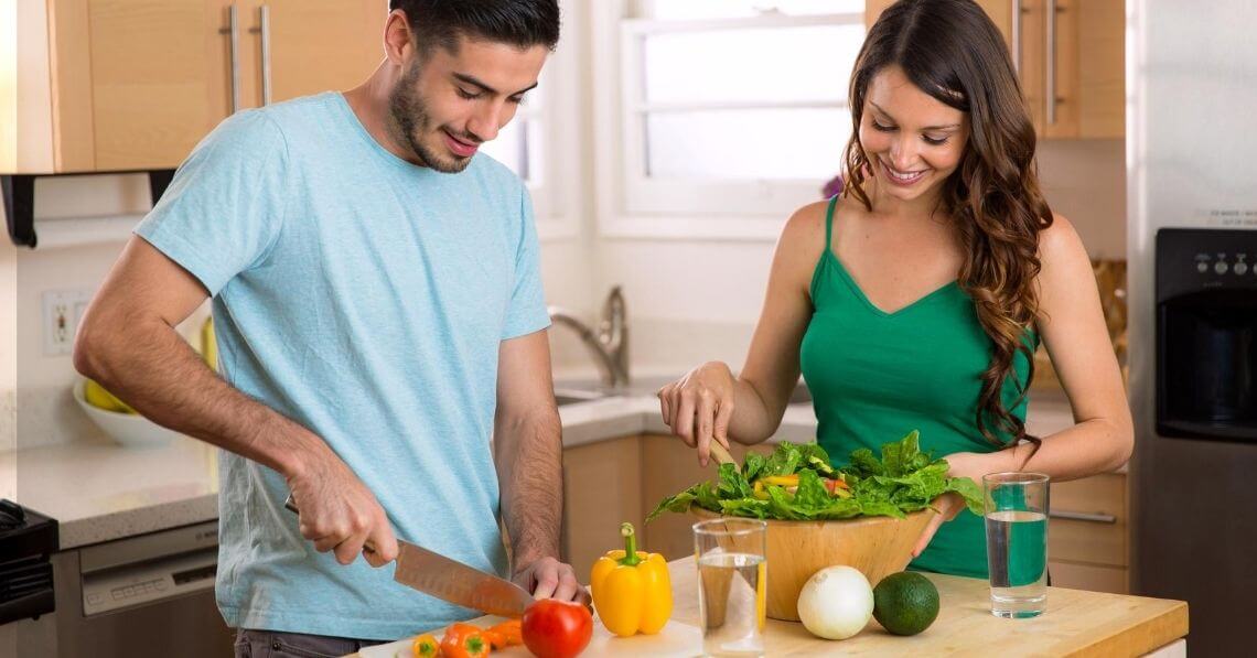 Young couple preparing a healthy meal