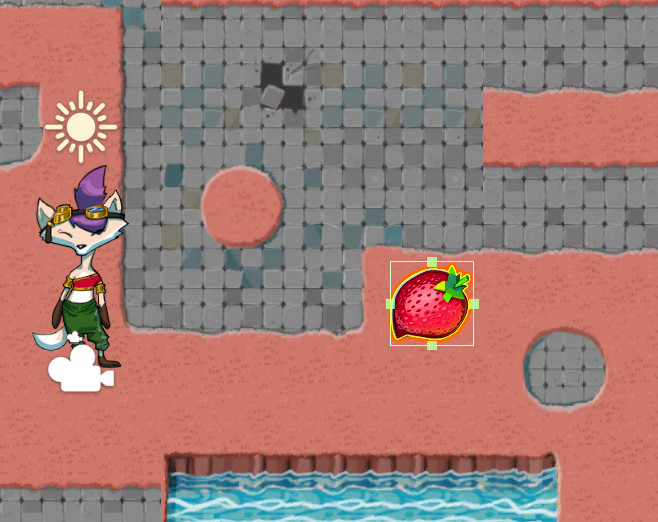 Ruby character and a strawberry collectible on the game map. The strawberry collectible is selected, with its Box Collider outline visible.