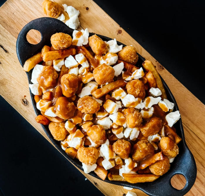 PROMO MAI / JUIN POUTINE POULET POP CORN