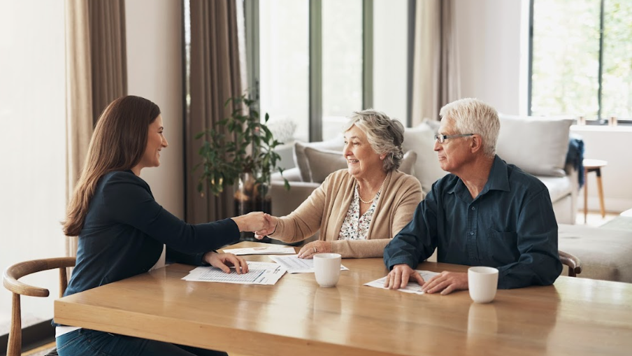Lawyer shaking hands with clients