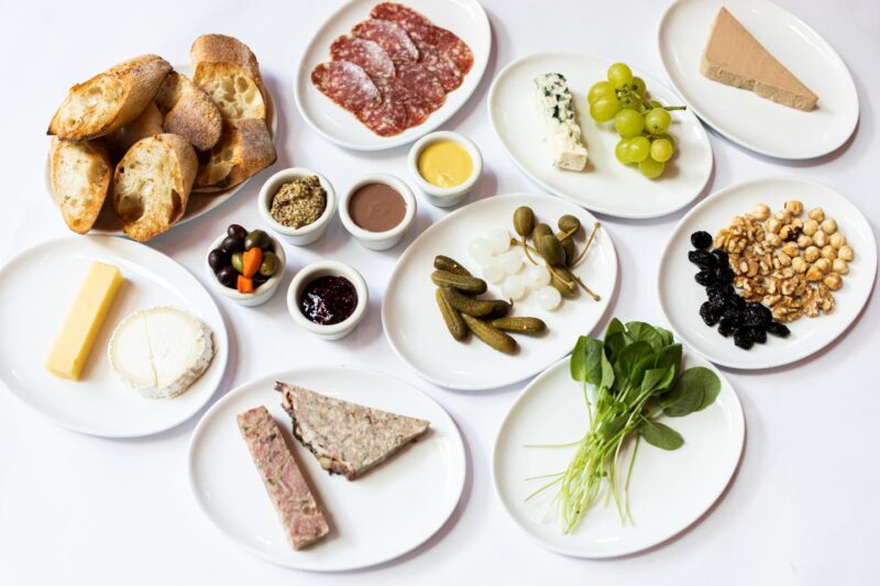 Array of charcuterie items and garnishes from Ami Gabi