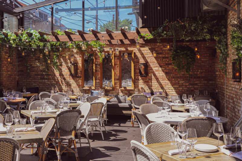 Dining tables and chairs at Stella Barra's Courtyard Patio