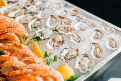 Raw bar with oysters, shrimp and lemons