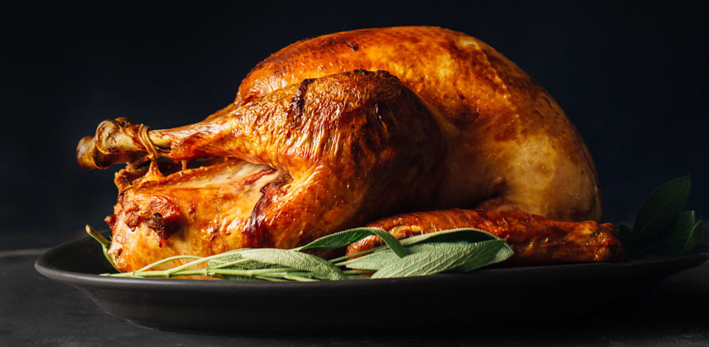 Classic whole roast turkey with sage and black pepper butter
