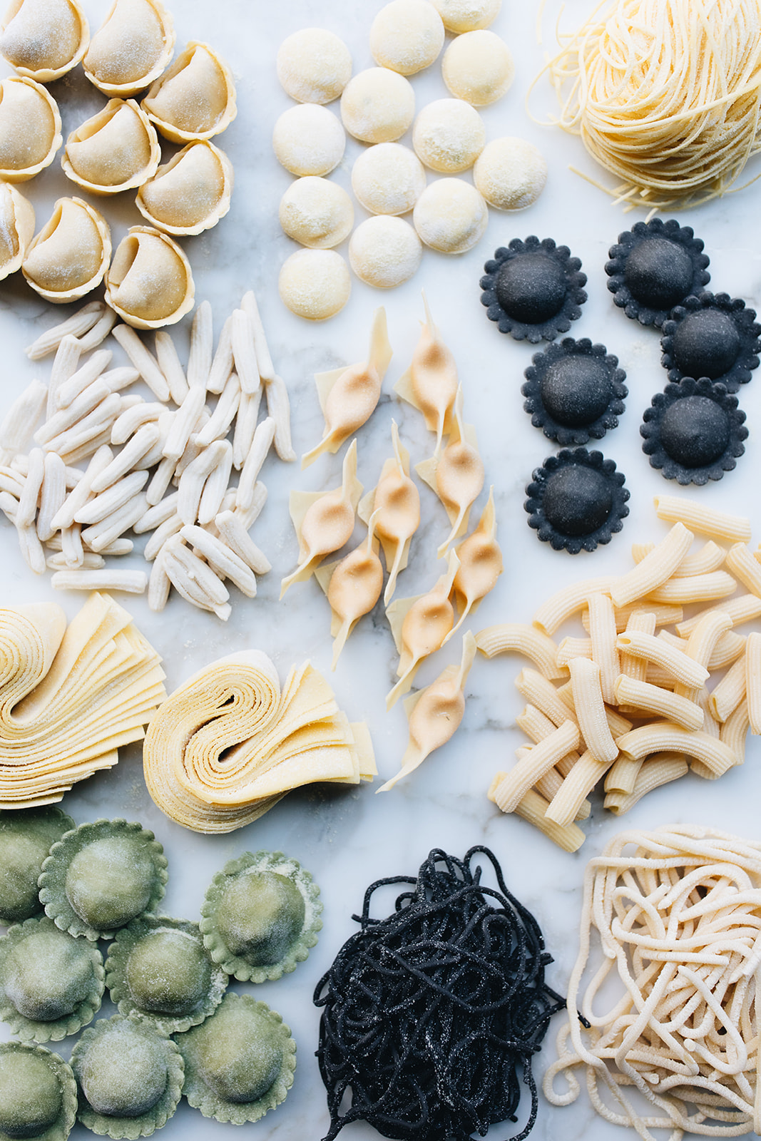 A variety of colorful pastas