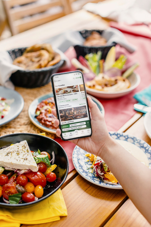 Download or Update Your App phone in hand