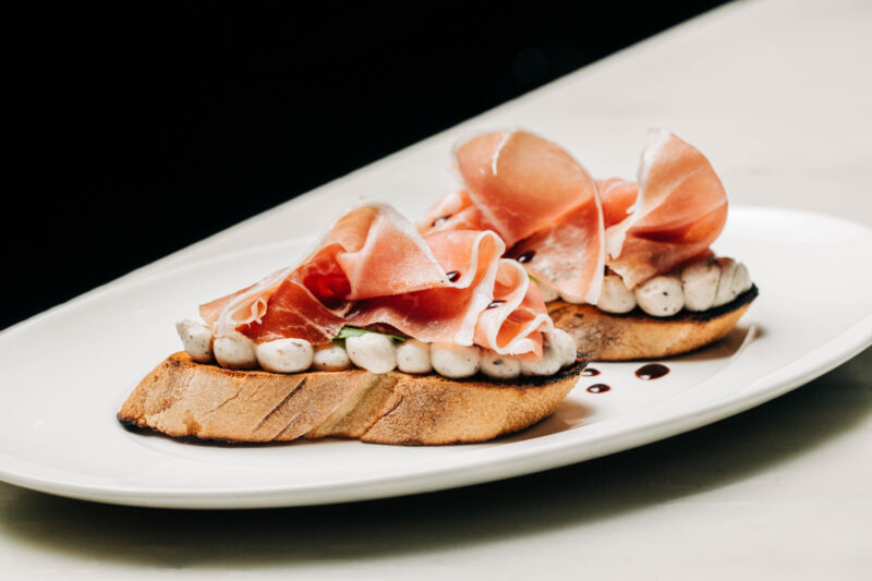 Proscuitto Bruschetta with Truffle Ricotta and Balsalmic Vinegar from RPM Italian