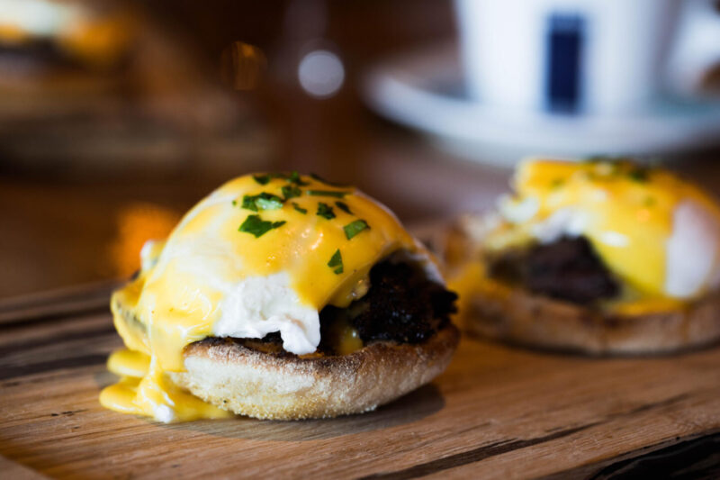 Saranello's Eggs Benedict on a board