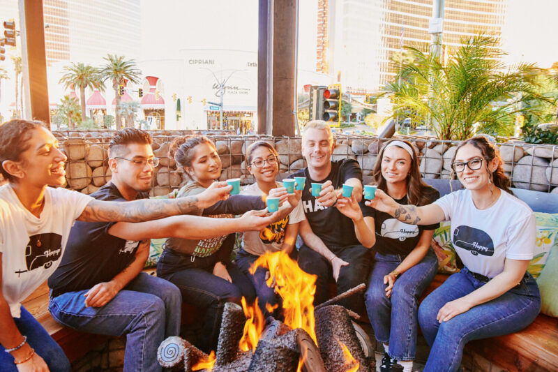 group dining cheers at Happy CAmper Las VEgas