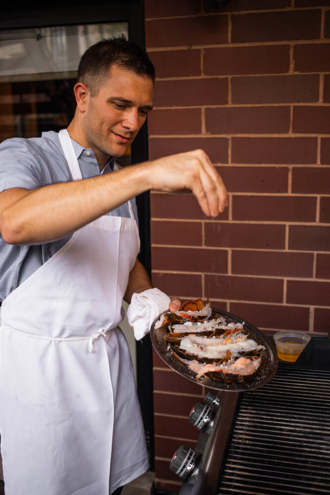 Chef Justin seasoning lobster tails