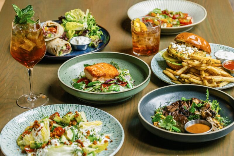 A spread of weekday lunch dishes at Aba Chicago