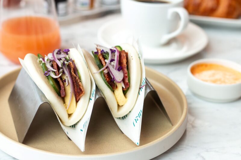 Breakfast Bao with egg custard, crunchy garlic aioli and cucumber