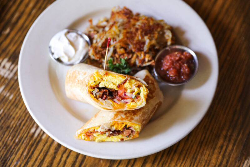 RJ Grunts Breakfast Burrito with hash browns and condiments