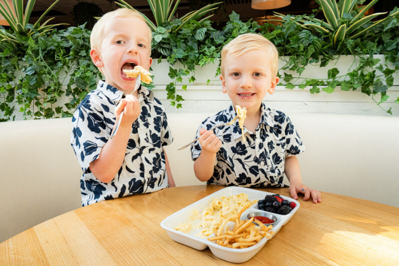 Children eating macaroni and cheese at Summer House