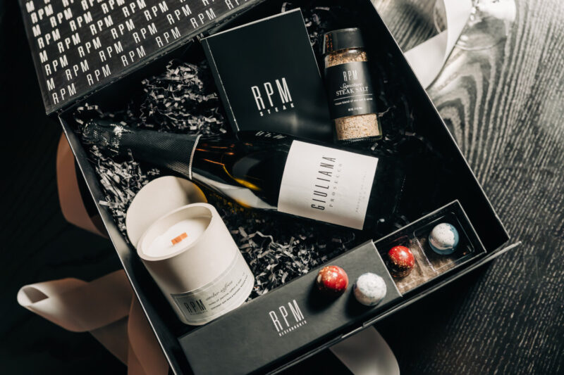 RPM Gift Box featuring Giuliana Prosecco, RPM Steak Salt, Chocolate Bon Bons and an RPM-inspired candle