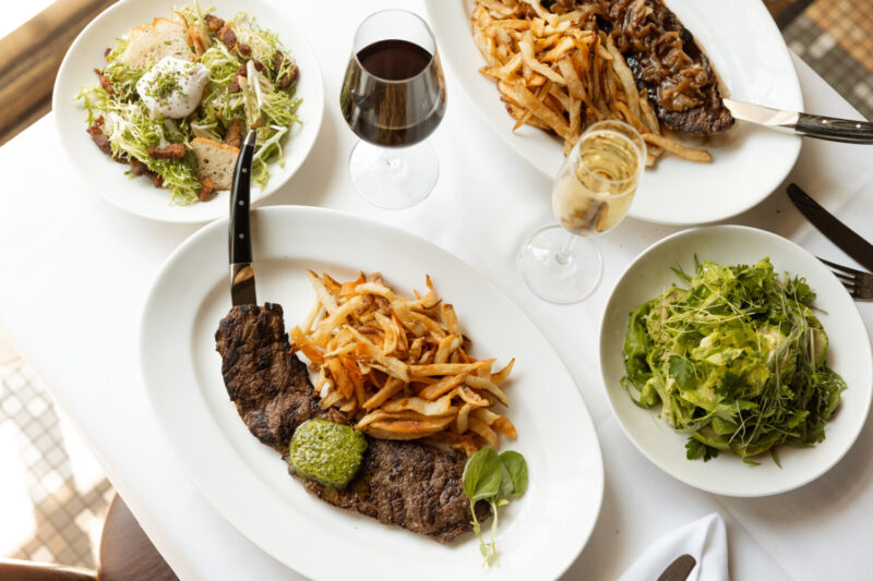 Steak Frites and Salads at Mon Ami Gabi