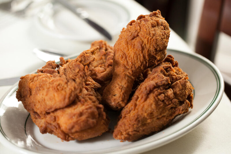 Plate of crispy and golden fried chicken from Joe's